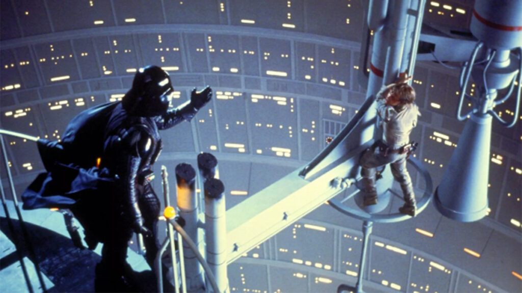 Darth Vader ofrece su ayuda a Luke Skywalker.