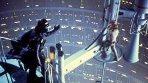 Darth Vader ofrece su ayuda a Luke Skywalker.