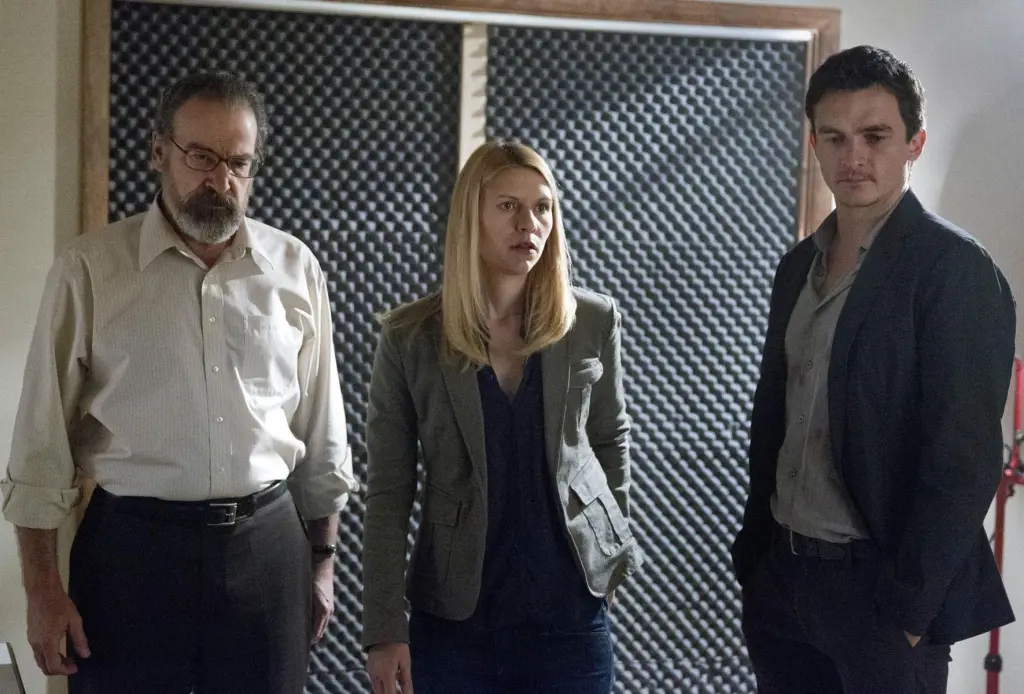 Los personajes de Saul Berenson, Carrie Mathison y Peter Quinn.